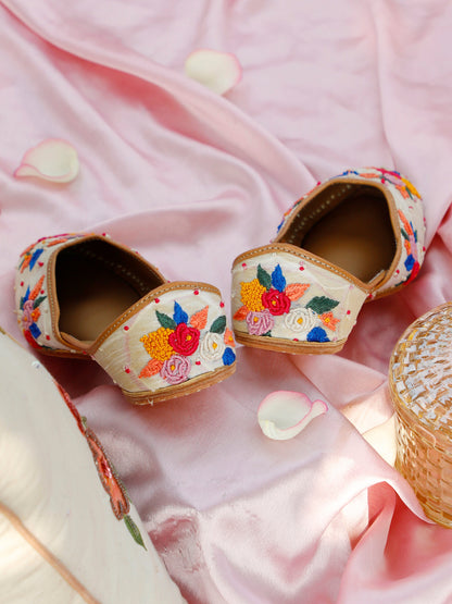 Blossom white embellished ethnic flats for women – top product view
