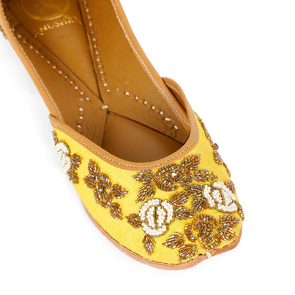 Sunshine yellow embellished ethnic flats for women – sole and heel view