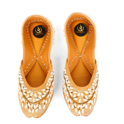 Moti Baag beige embellished ethnic flats for women – lifestyle view