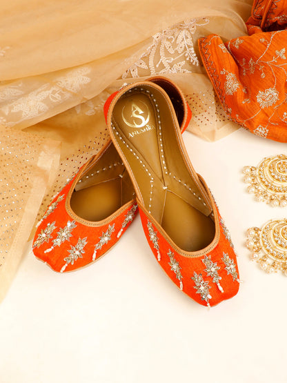 Saffron orange embellished ethnic flats for women – front product view