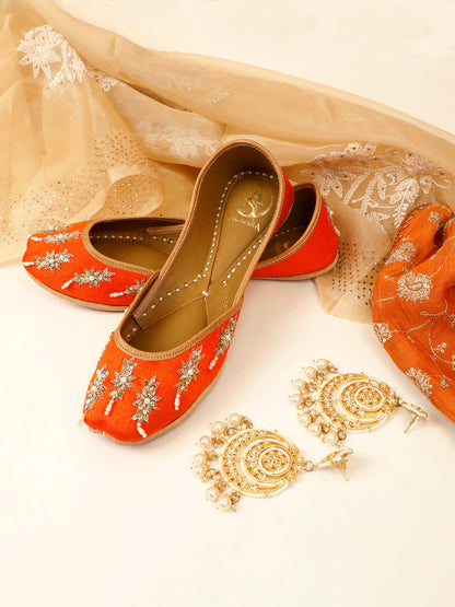 Saffron orange embellished ethnic flats for women – side product view