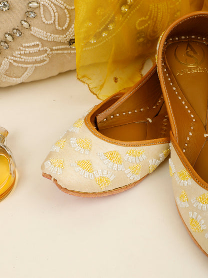 Sunehri Phool white embellished ethnic flats for women – top product view