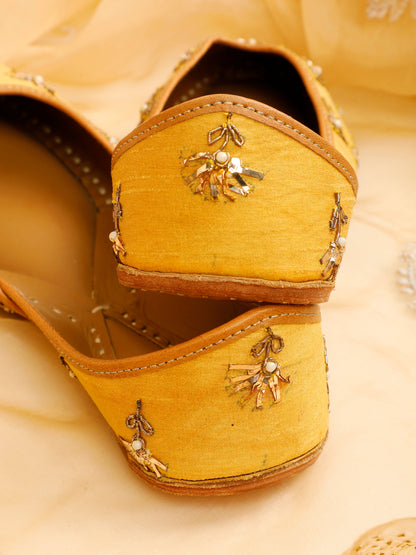 Fawn yellow embellished ethnic flats for women – top product view
