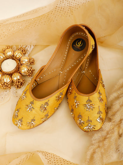 Fawn yellow embellished ethnic flats for women – front product view