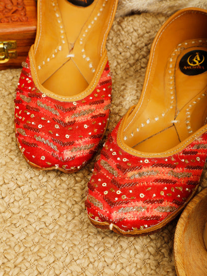 Leher red embellished jutti for women – top product view