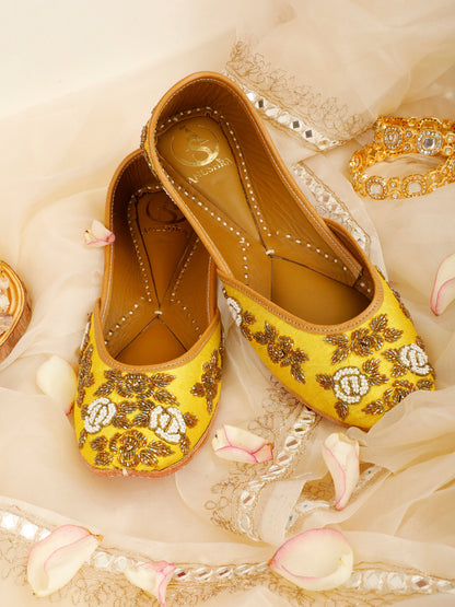 Sunshine yellow embellished ethnic flats for women – front product view