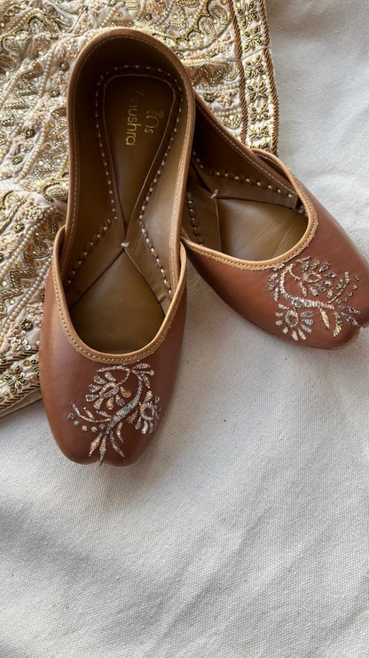 Jhhilmil brown embellished jutti for women – top product view
